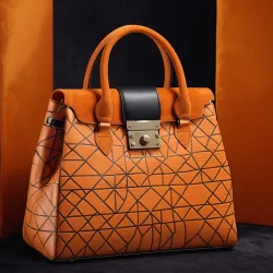 photo of #7 orange synthetic leather bag
