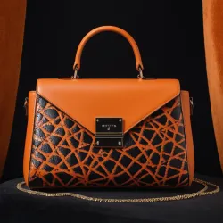 photo of #7 orange synthetic leather bag