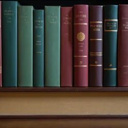 photo of #2 multicolor books on shelves