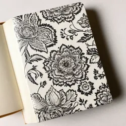 photo of #4 white book with black floral pattern