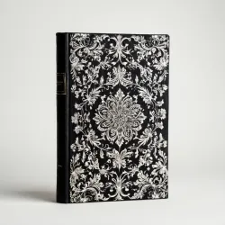 photo of #4 white book with black floral pattern