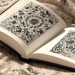 photo of #4 white book with black floral pattern