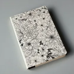 photo of #4 white book with black floral pattern