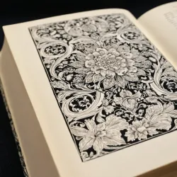 photo of #4 white book with black floral pattern