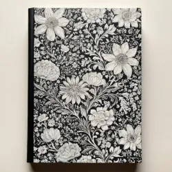 photo of #4 white book with black floral pattern