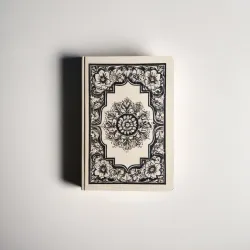 photo of #4 white book with black floral pattern