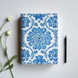 photo of #5 white book with blue floral pattern