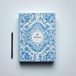 photo of #5 white book with blue floral pattern