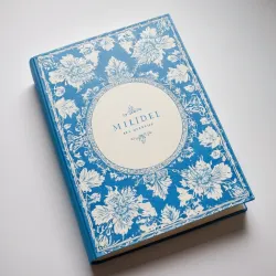 photo of #5 white book with blue floral pattern