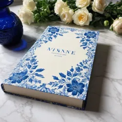 photo of #5 white book with blue floral pattern