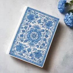 photo of #5 white book with blue floral pattern