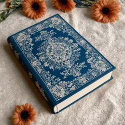 photo of #5 white book with blue floral pattern