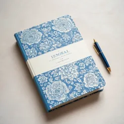 photo of #5 white book with blue floral pattern