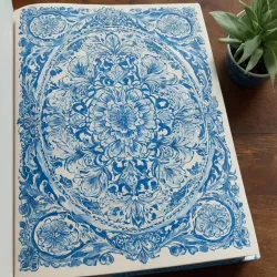 photo of #5 white book with blue floral pattern