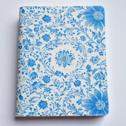 photo of #5 white book with blue floral pattern