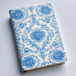 photo of #5 white book with blue floral pattern