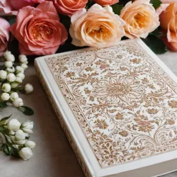 photo of #6 white book with floral pattern