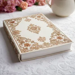 photo of #6 white book with floral pattern