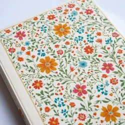 photo of #6 white book with floral pattern