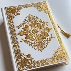 photo of #7 white book with golden floral pattern
