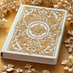photo of #7 white book with golden floral pattern