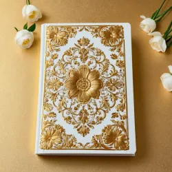 photo of #7 white book with golden floral pattern