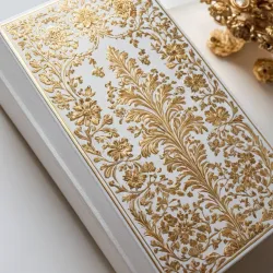 photo of #7 white book with golden floral pattern