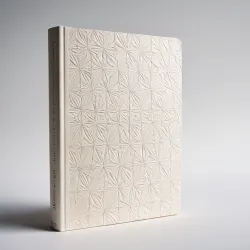 photo of #8 white book with golden geometrical pattern