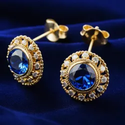 photo of #3 golden earrings with blue gem