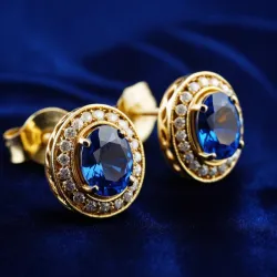 photo of #3 golden earrings with blue gem