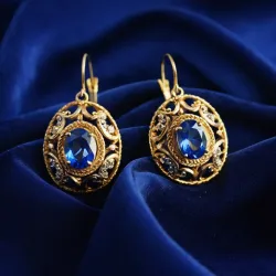 photo of #3 golden earrings with blue gem