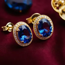 photo of #3 golden earrings with blue gem
