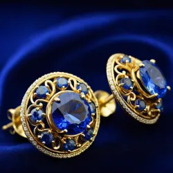 photo of #3 golden earrings with blue gem