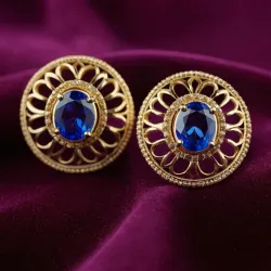 photo of #3 golden earrings with blue gem