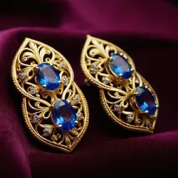 photo of #3 golden earrings with blue gem