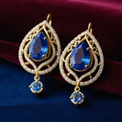 photo of #3 golden earrings with blue gem