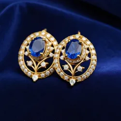 photo of #3 golden earrings with blue gem