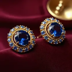 photo of #3 golden earrings with blue gem
