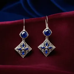photo of #5 silver earrings with blue gem
