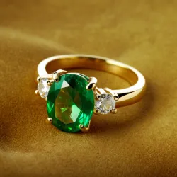photo of #3 golden ring with green gem
