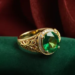 photo of #3 golden ring with green gem