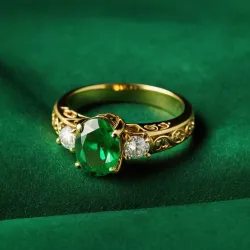 photo of #3 golden ring with green gem