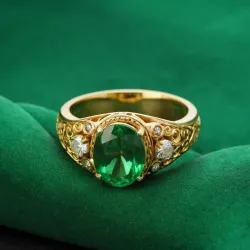photo of #3 golden ring with green gem