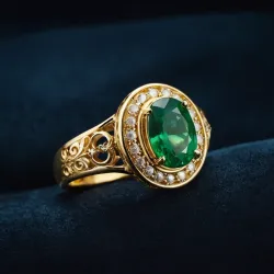 photo of #3 golden ring with green gem