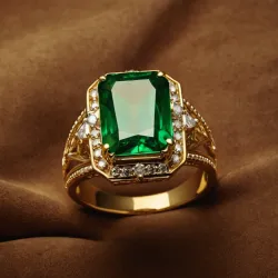 photo of #3 golden ring with green gem