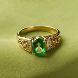 photo of #3 golden ring with green gem