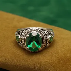 photo of #5 silver ring with green gem