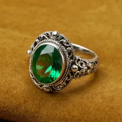 photo of #5 silver ring with green gem