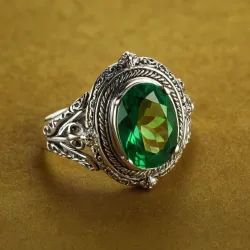 photo of #5 silver ring with green gem