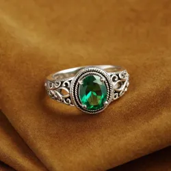 photo of #5 silver ring with green gem